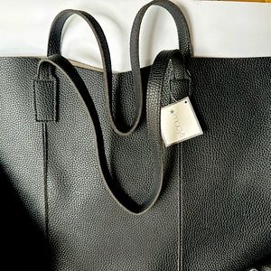 Brand new with tags black leather tote. Perfect leather tote for everything.
